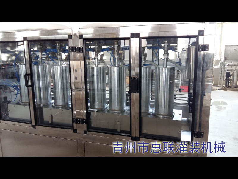 活塞式白酒灌裝機(jī) 活塞式白酒灌裝機(jī)