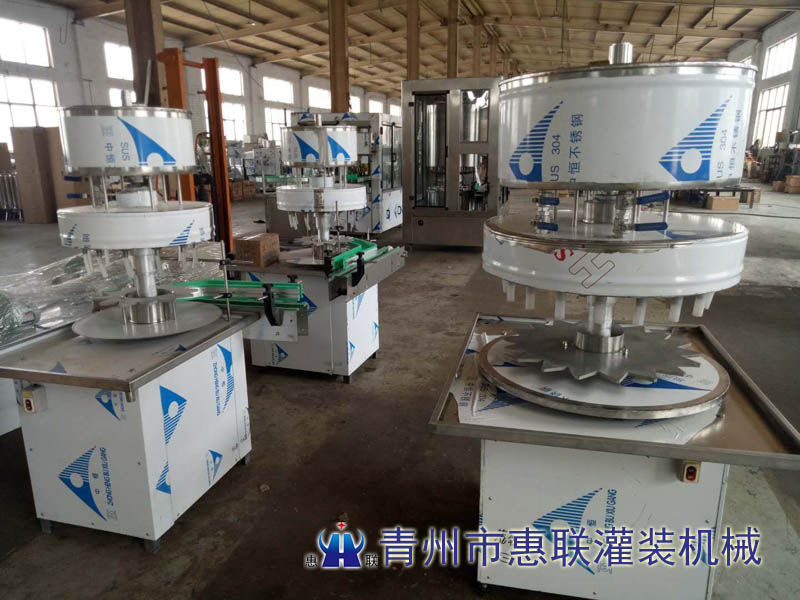 多功能液體灌裝機(jī) 多功能液體灌裝機(jī)