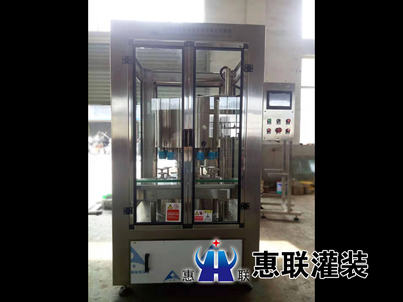 全自動(dòng)小型白酒灌裝機(jī) 全自動(dòng)小型白酒灌裝機(jī)