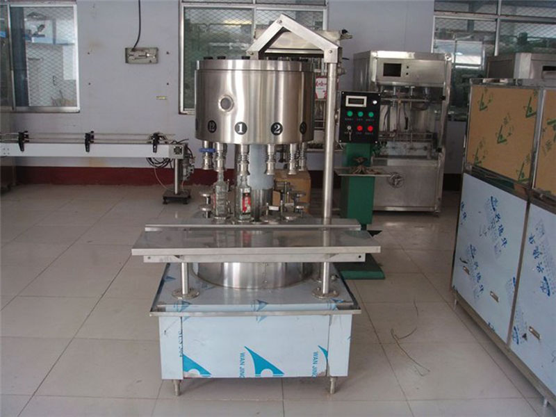 全自動(dòng)白酒灌裝機(jī) 全自動(dòng)白酒灌裝機(jī)